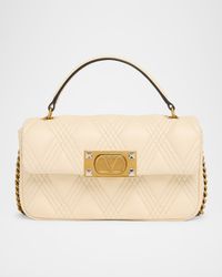 Rockstud Quilted Leather Top-Handle Bag