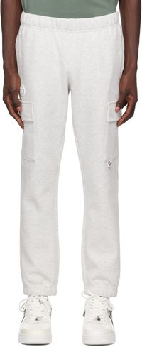 AAPE by A Bathing Ape Pantalon cargo gris en molleton à logos AAPE Now
