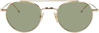 Thom Browne Lunettes de soleil rondes dorées en titane