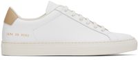 Common Projects Baskets rétro blanc et beige en cuir grainé