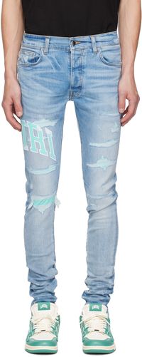AMIRI Blue Embroidered Varsity Logo Repair Jeans