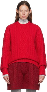 JW Anderson Pull rouge en tricot câblé à col ras du cou
