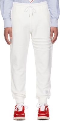 Thom Browne Pantalon de détente blanc à quatre rayures et à garniture tricolore