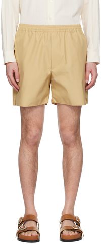 AURALEE Short beige à fentes