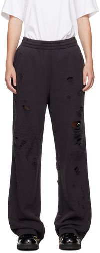 We11done Pantalon de survêtement noir à effet usé