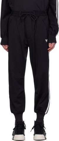 Y-3 Pantalon de survêtement noir à trois rayures et à revers en tricot côtelé
