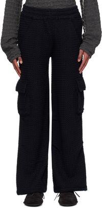 Isa Boulder Pantalon noir à motif chevronné exclusif à SSENSE