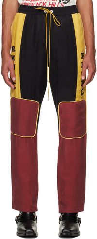 Rhude Pantalon jaune et bourgogne à panneaux