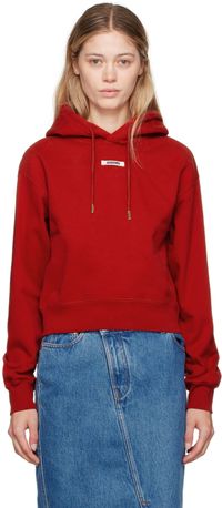 JACQUEMUS Pull à capuche rouge à écusson en gros-grain - La casa