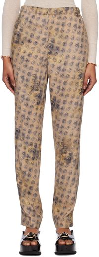 Acne Studios Pantalon beige à motif fleuri