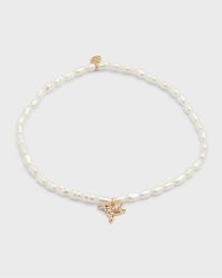 14K Tiny Hummingbird Charm on White Rice Pearl Bracelet