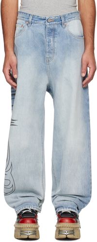 VETEMENTS Jean ample bleu à logo de style metal