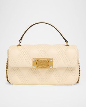 Rockstud Quilted Leather Top-Handle Bag