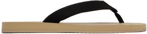 The Row Tongs Dune beige et noir