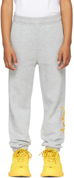 drew house Enfant | Pantalon de survêtement gris à logo griffonné exclusif à SSENSE