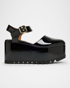 Elyse Patent Platform Pumps