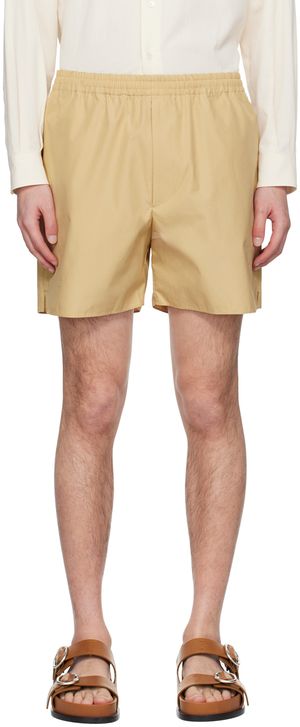 AURALEE Short beige à fentes