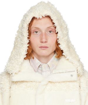 young n sang Capuche beige en fourrure synthétique